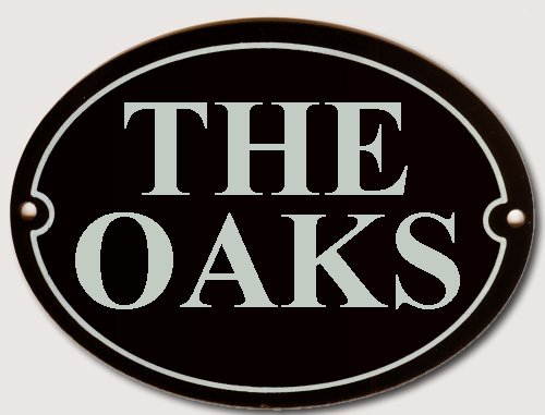House Name Oval Black enamel plate with White letters 300mm wide x 200mm high.   POA